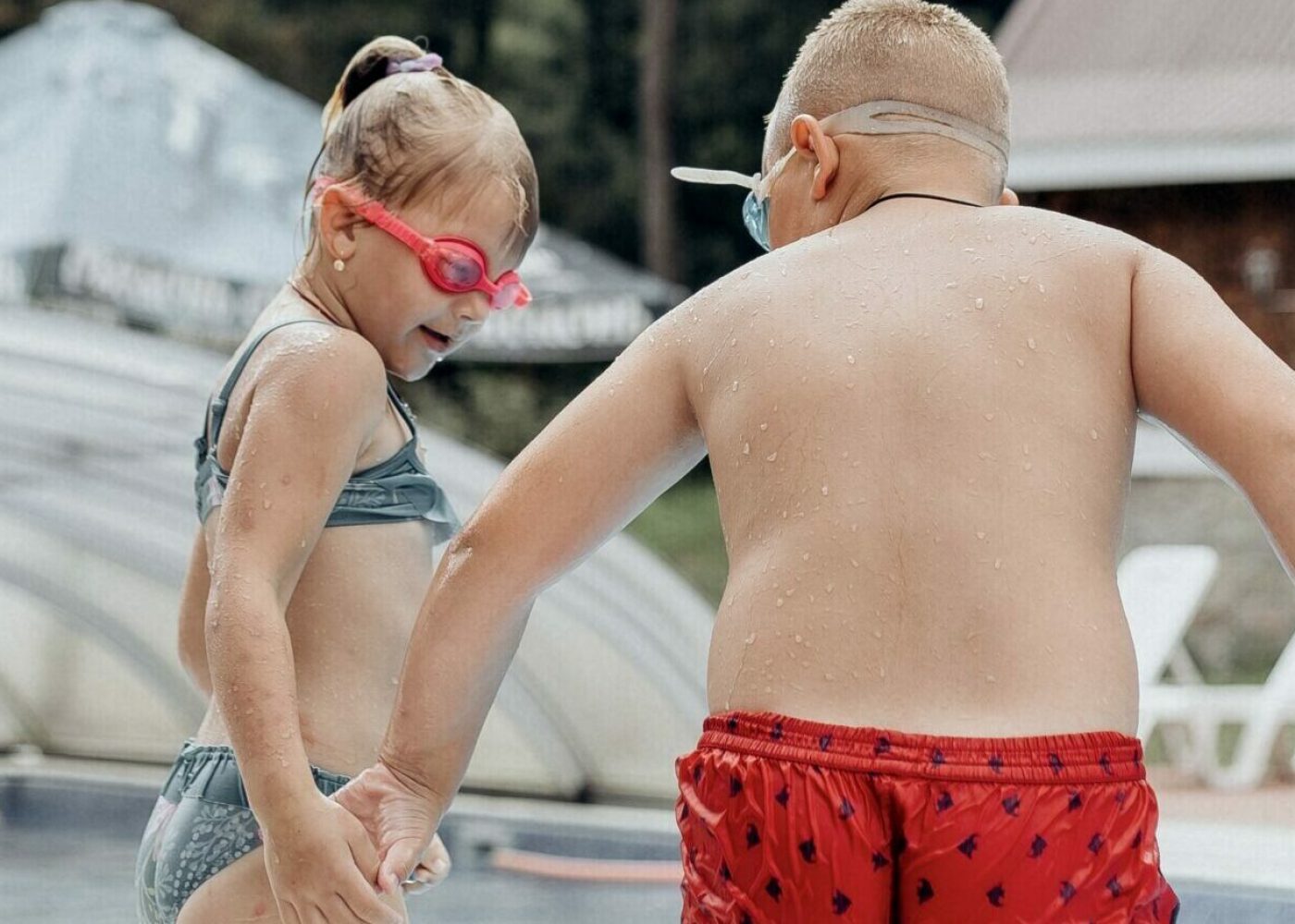 girl and boy in pool